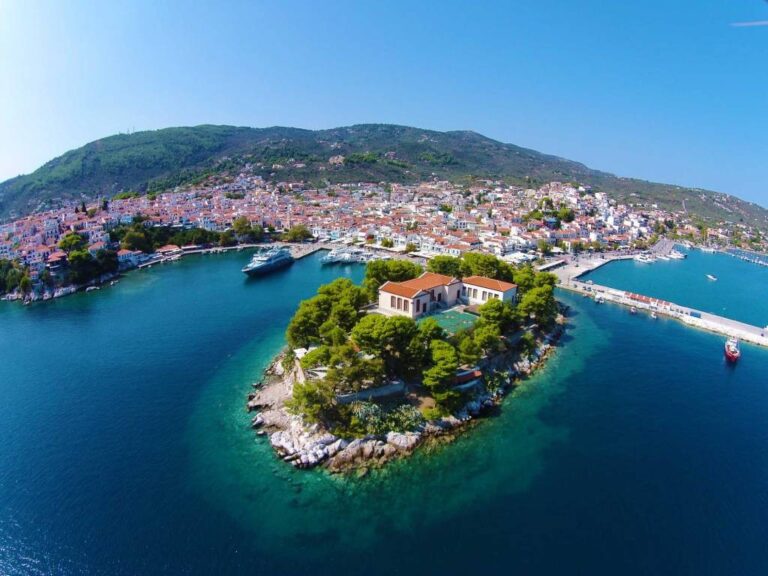 Discover the beauty of Skiathos island with its turquoise waters, golden sandy beaches, and lush green hills, as featured on AdoreGreece.com – your ultimate travel guide to Greece